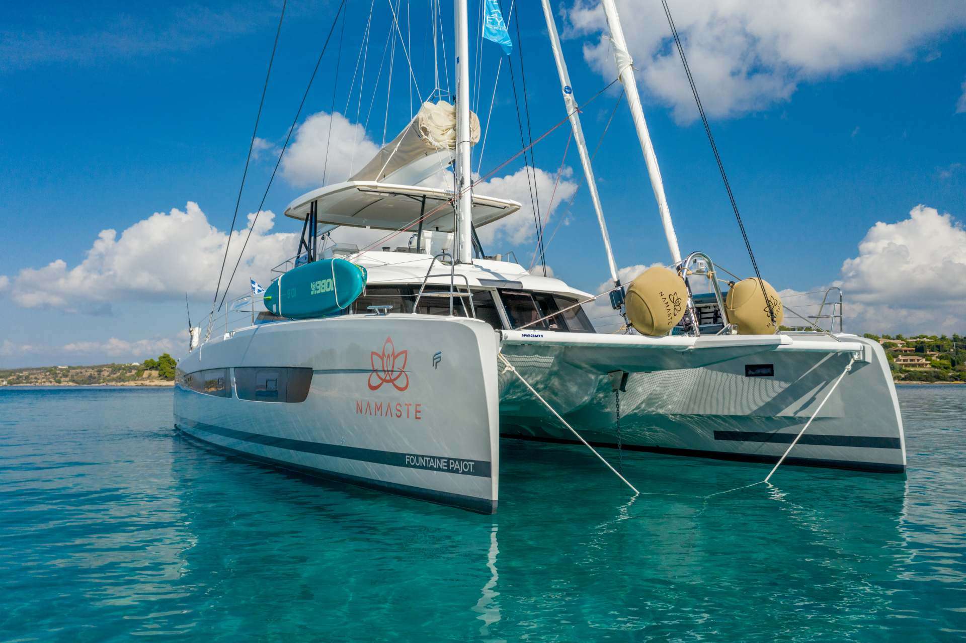 Namaste Crewed Samana 59 Catamaran Charter Anchored in Greece