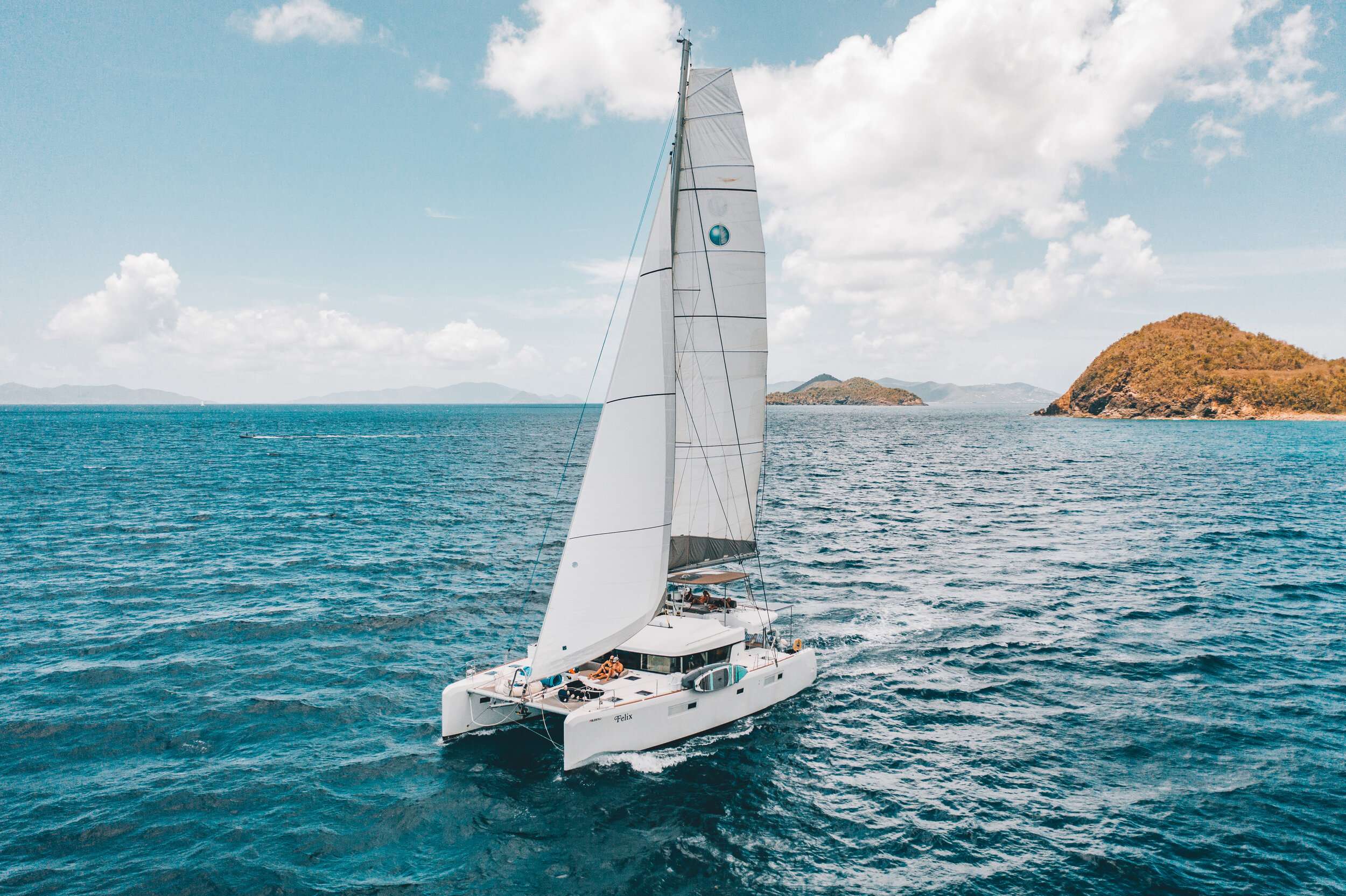 Feliz Crewed Lagoon 52 Catamaran Discount Sailing the Virgin Islands