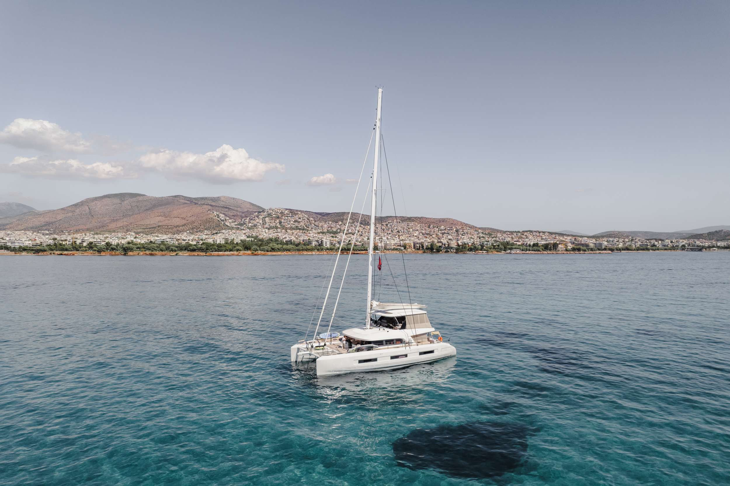 White Caps crewed Lagoon Sixty 5 catamaran charters Sailing Greece.