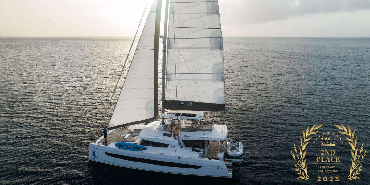 Mystic Crewed Bali 5.4 Catamaran Charter Sailing the BVI