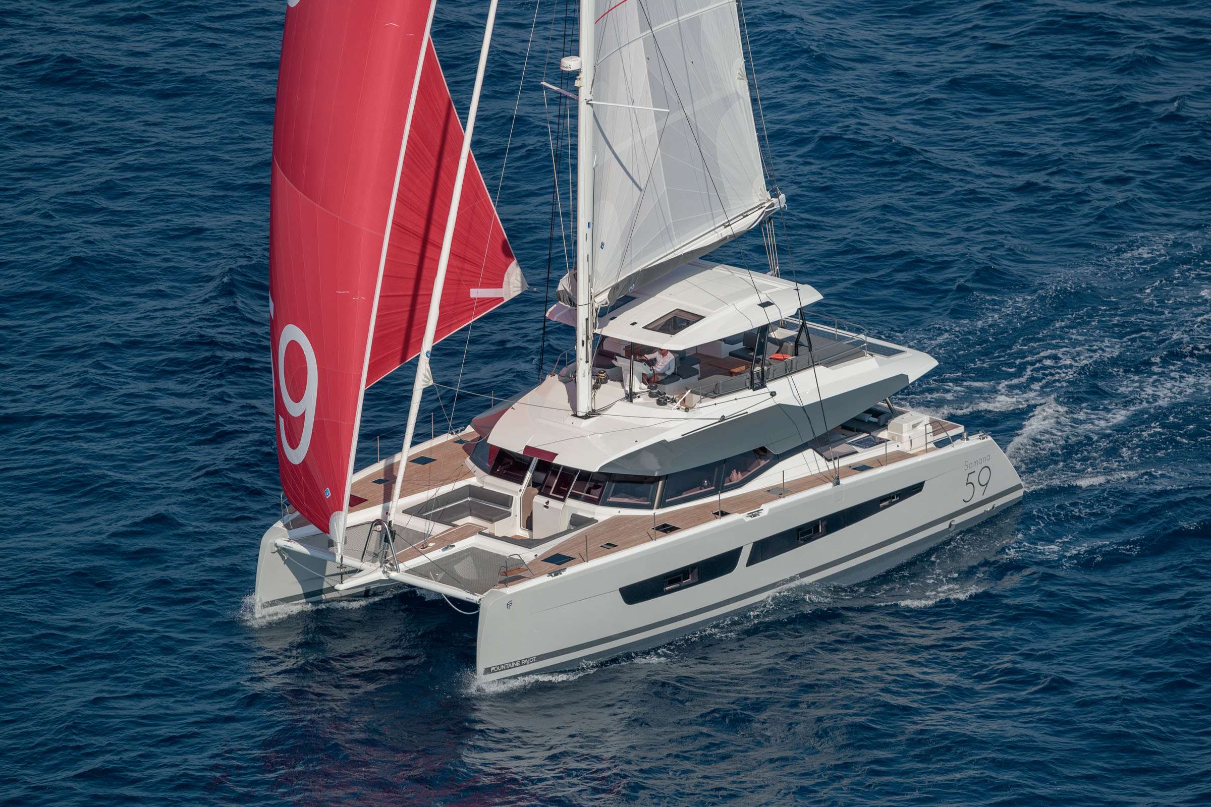 Plus 10 Crewed Samana 59 Catamaran Charter Sailing the BVI